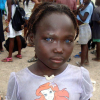 a Haitian girl with blue eyes